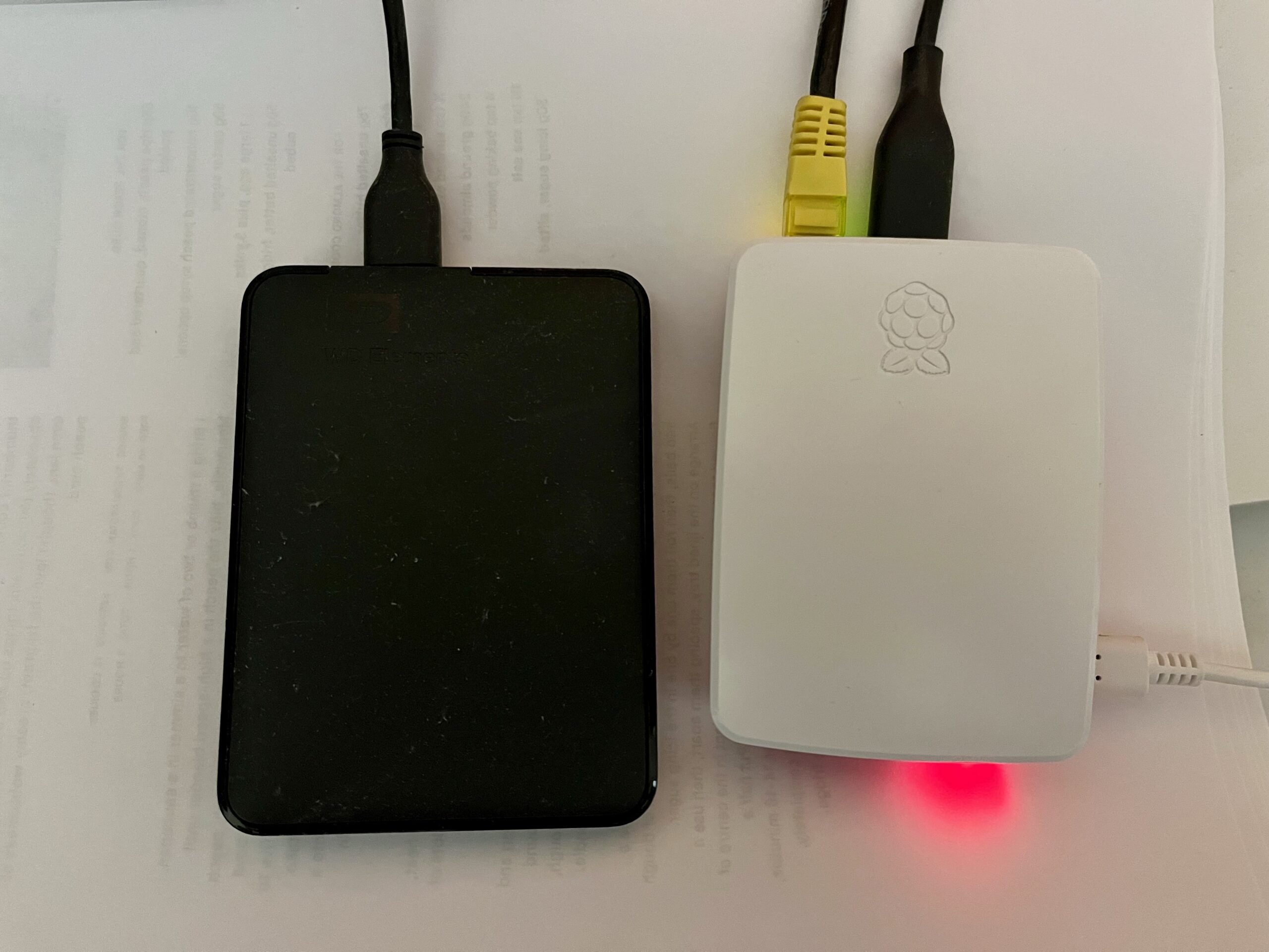 A photo of a Raspberry Pi 4 connected to a USB external hard drive