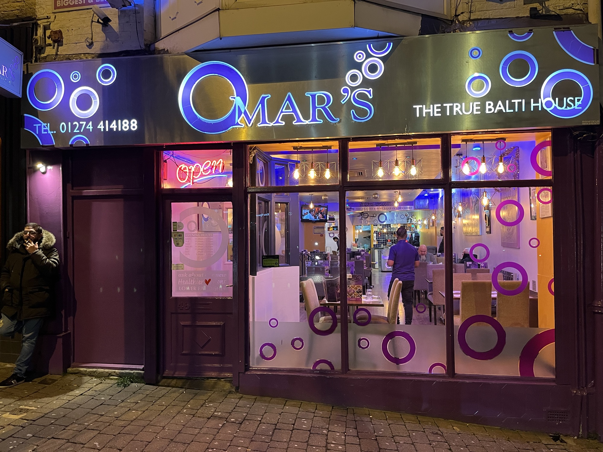 A photo the outside of Omar's Balti House in Bradford