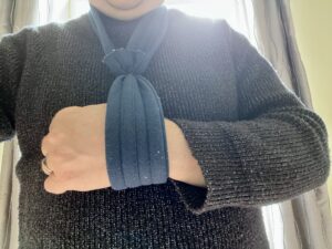 A photo of me wearing a sling