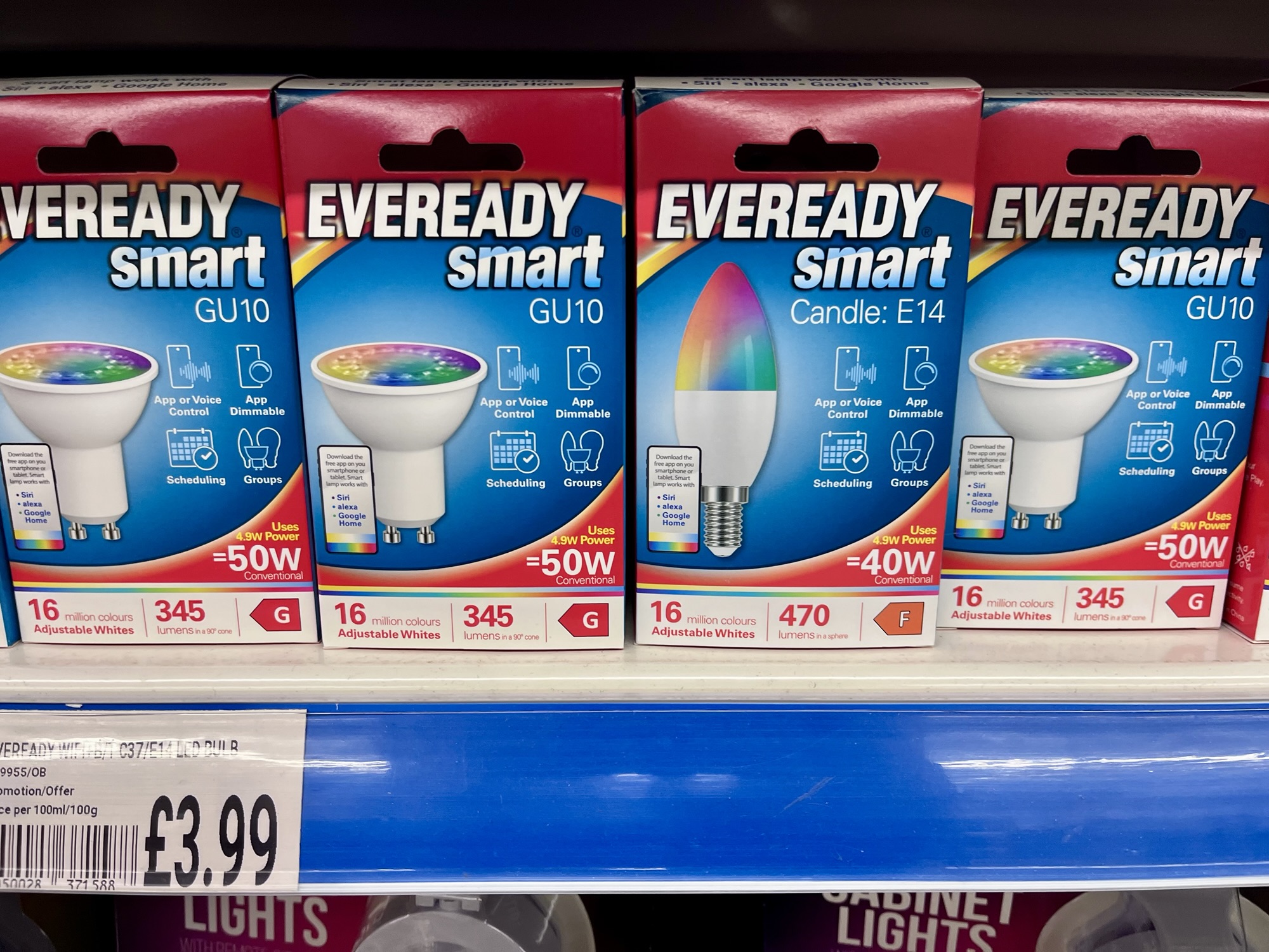 A photo of several boxes containing Eveready smart light bulbs costing £3.99 at B&Ms