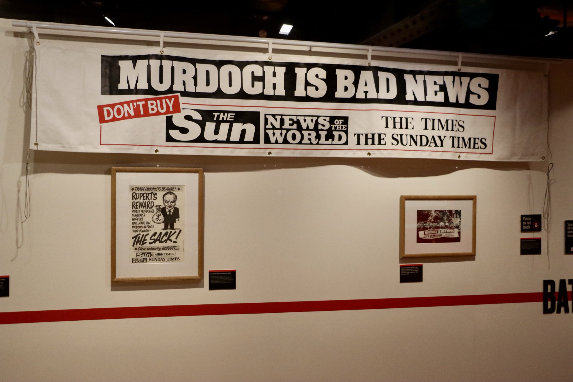 A banner stating 'Murdoch is Bad News' encouraging people to boycott The Sun and The Times, at the People's History Museum in Manchester