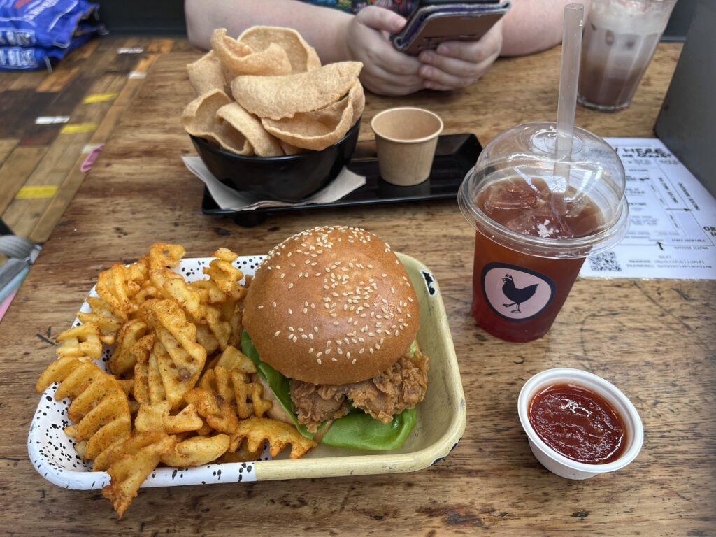My order of a chicken burger with waffle fries and a strawberry iced tea from Mummas at Mackie Mayor